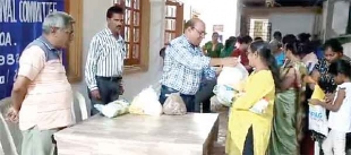 Christmas Festival Committee distributes food grain to needy