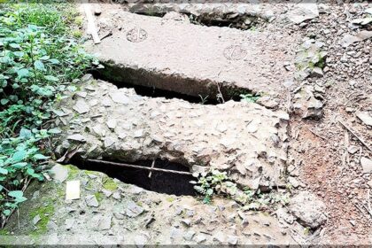 Concrete drain slabs on the verge of collapse