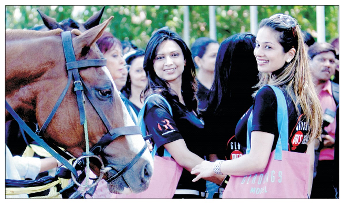 Contestants of the 'Mrs India 2009' competition look back during a promotional event in Mumbai on Thursday.  Twenty two finalists, selected from across the country, will be vying for the coveted 'Mrs India 2009' crown in Mumbai on March 15.