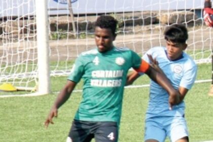 Cortalim Villagers walk past Mumbai City