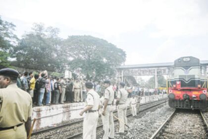 Curchorem MLA Nilesh Cabral along with the people on the railway platform