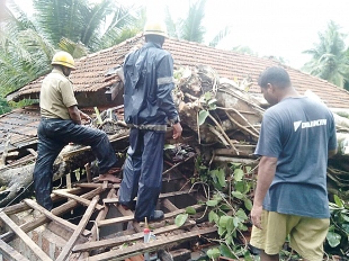Curchorem fire personnel busy clearing uprooted trees