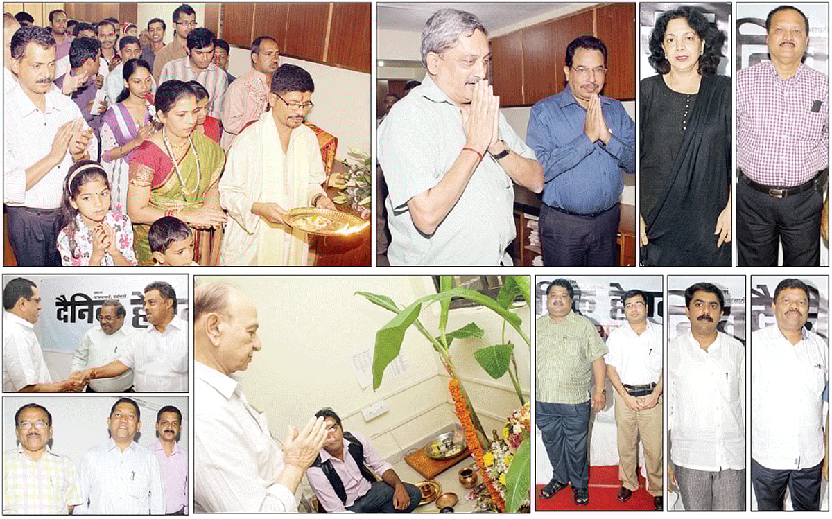 Dainik Herald staff performing the puja at the office premises
