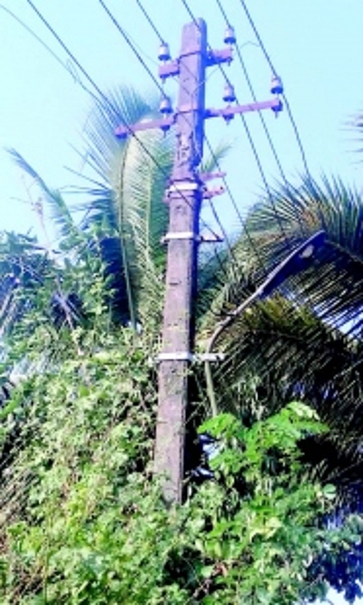 Damaged electricity pole poses threat