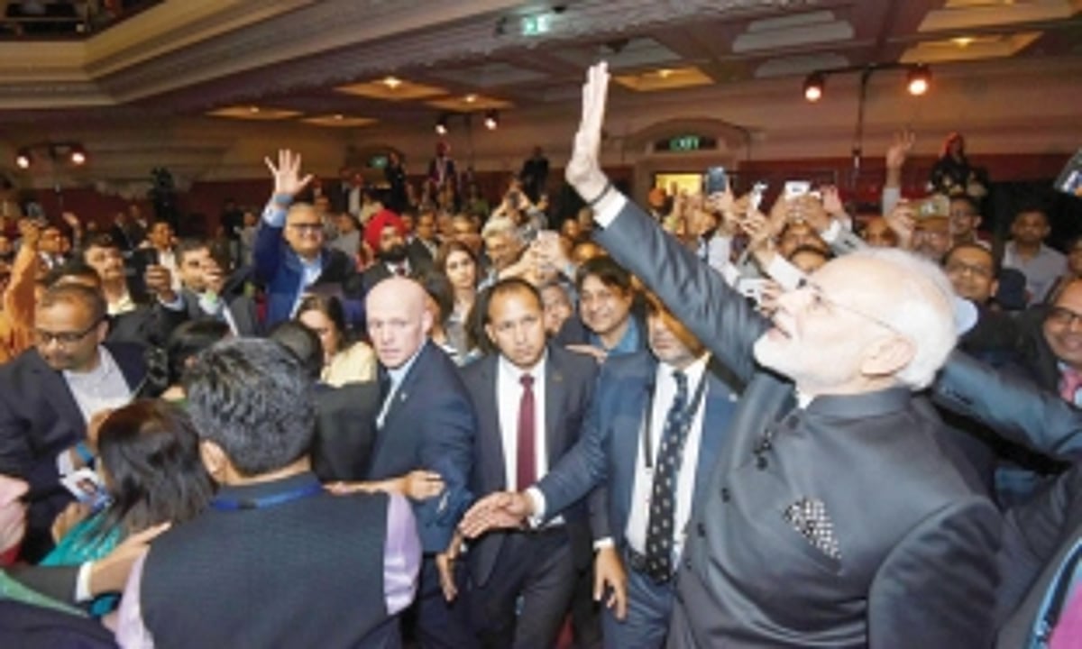 Demonstrations greet Modi in UK, turn aggressive as Indian tricolour ripped