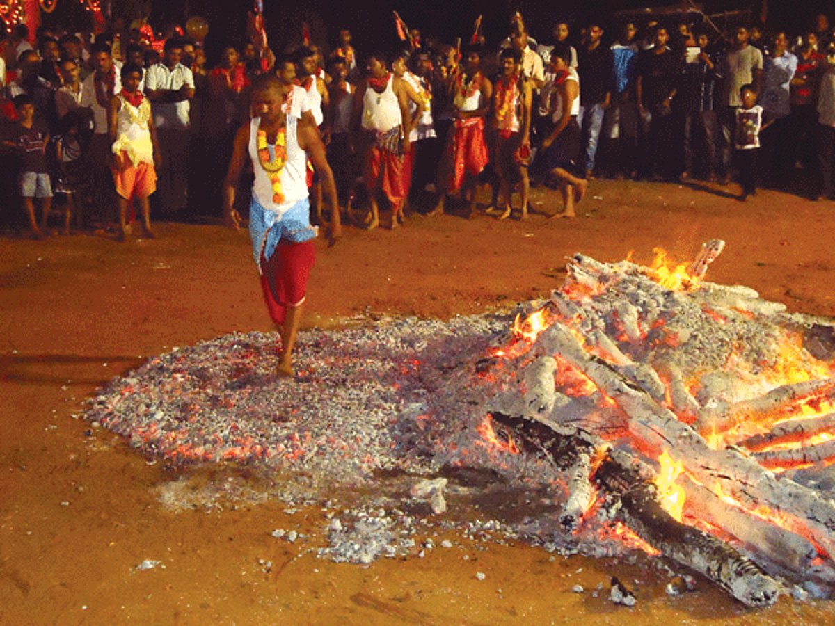 Devotees walk on fire over embers at Homkund festival at Bicholim on Wednesday.