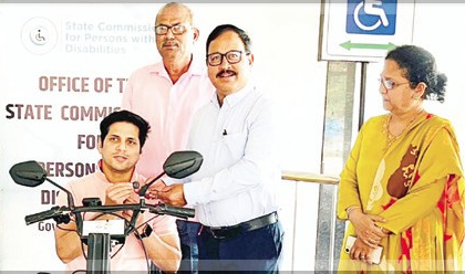 Differently-abled man receives motorised wheelchair