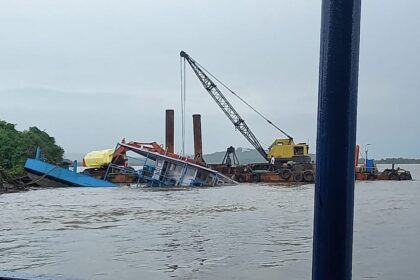 Efforts begin to refloat the sunken ferry, The authorities have begun the process to remove the partially submerged ferry boat from the Mandovi river at Chorão