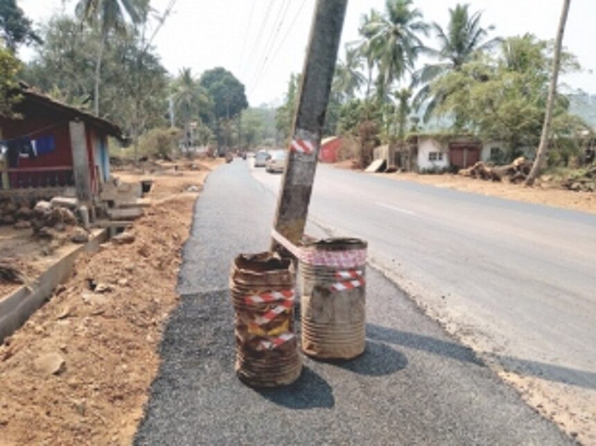 Electricity dept flayed for not removing poles on NH17-A 1 Electricity dept flayed for not removing poles on NH17-A