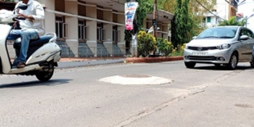 Elevated finishing of manholes add to the woes of Vasco riders