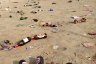 Empty beer bottles at Vasco park