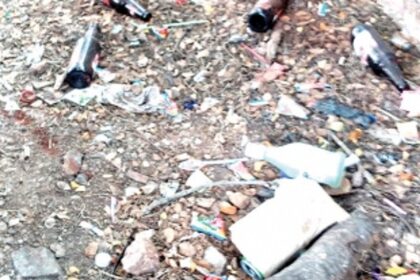 Empty, broken bottles lie strewn all over Chicalim children park