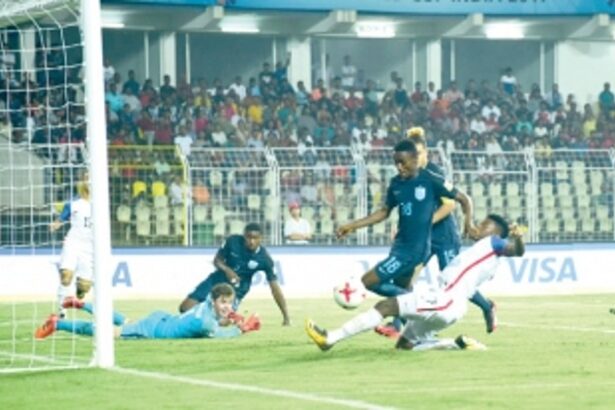 England’s Brewster bruises USA