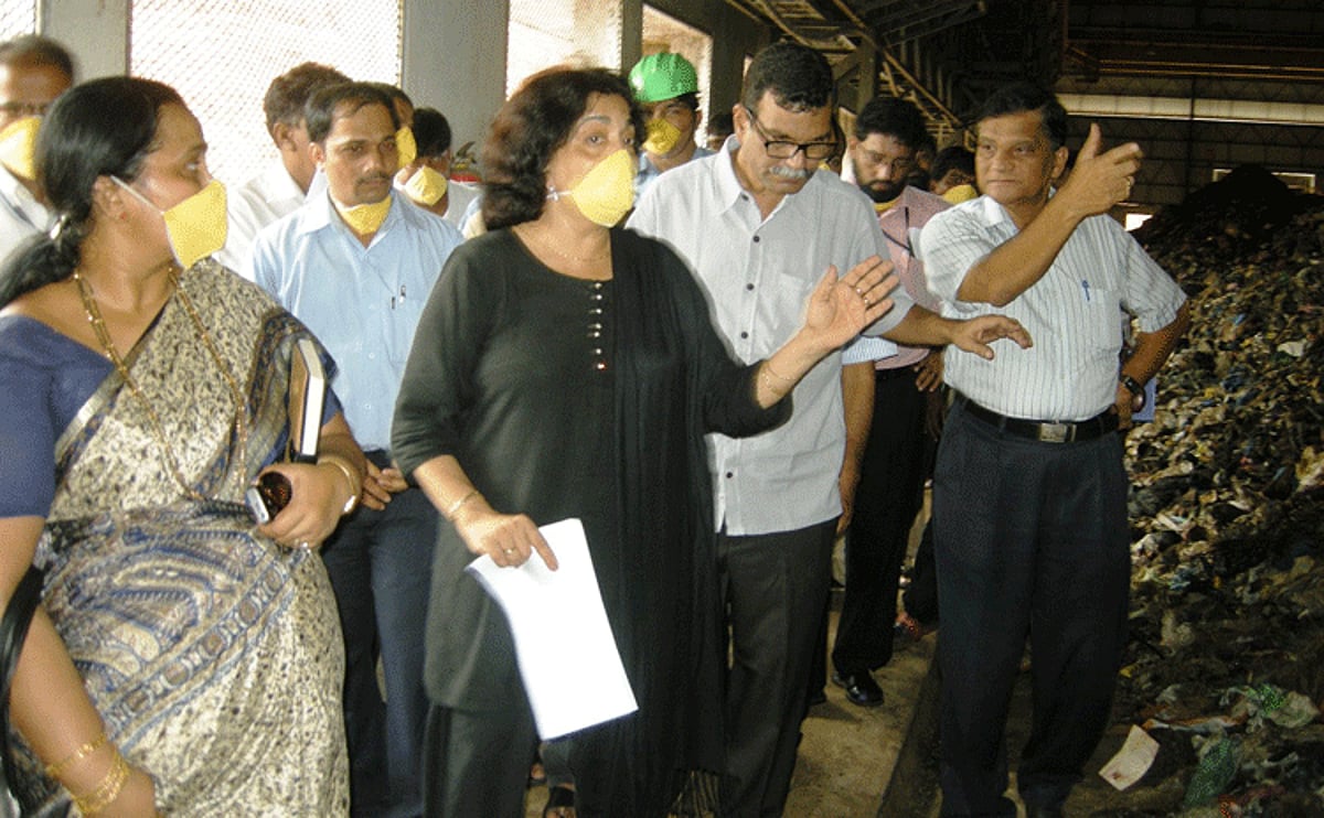 Environment Minister Alina Saldanha with officials at the Sonsodo waste treatment plant