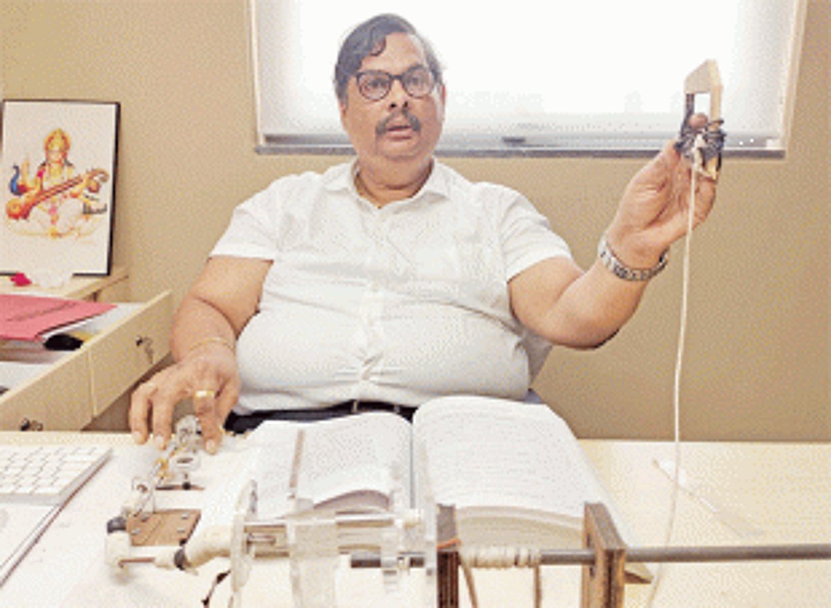 Extending a helping hand to turn book pages by foot