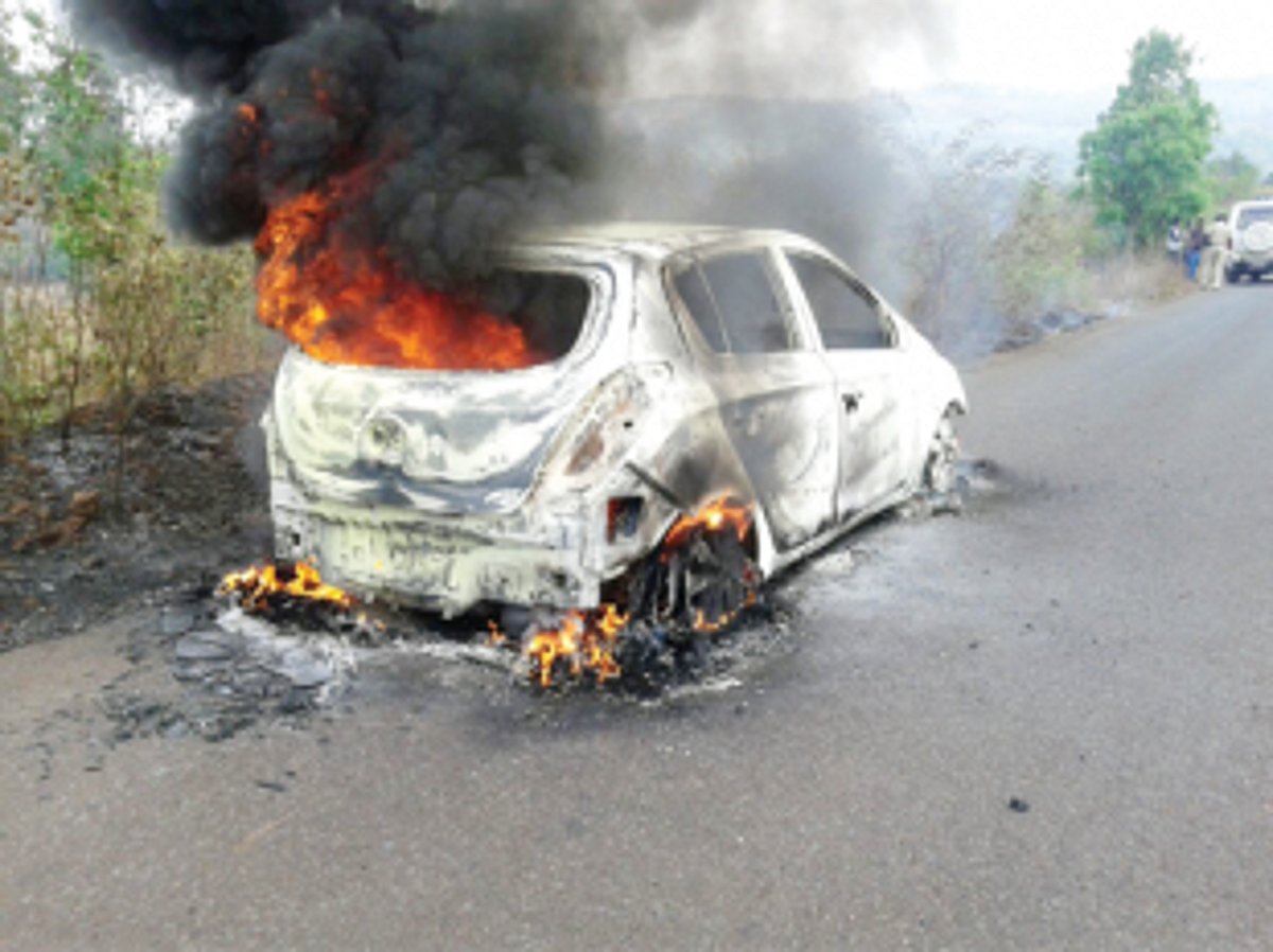 Family escapes as car catches fire
