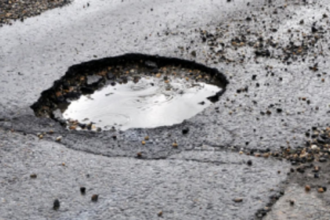 Fill the   pothole on   31st January Road