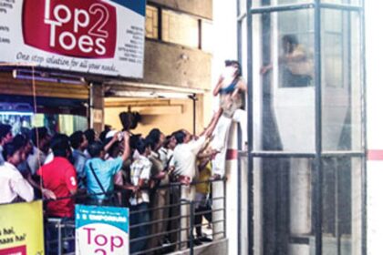 Firefighters rescue a toddler after breaking open the glass of an elevator