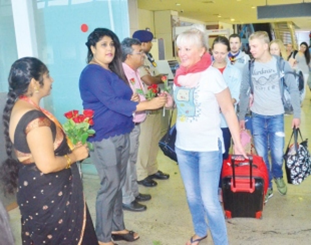 First chartered flight with  519 Russians lands in Goa