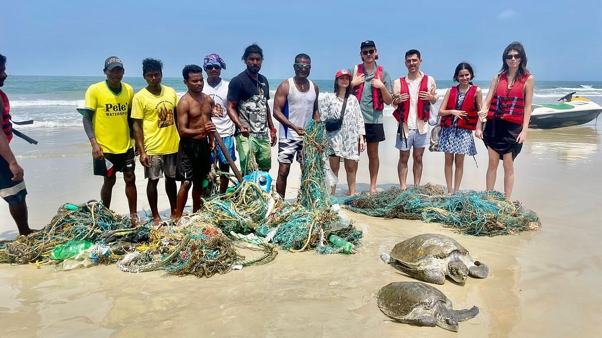 Fisherman Pele rescues two turtles off Benaulim Beach in Goa