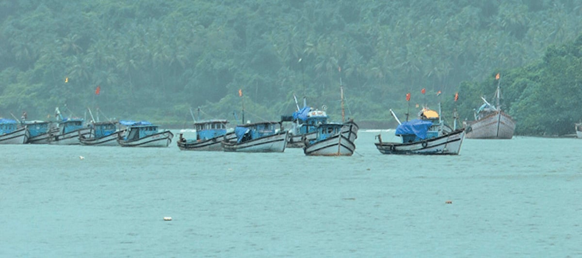 Fishing vessels anchored in River Sal waiting to venture out in the sea on Friday.