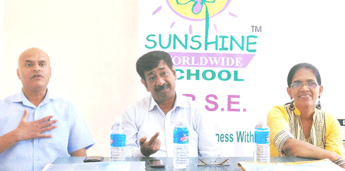 Founder and Managing Trustee of Sunshine Worldwide School Deepak Khaitan addresses the media in the presence of school Principal Anil Kashyap and Vice Principal Sunita Rodrigues.