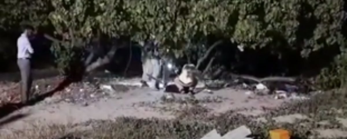 Four held in murder case while fleeing State via train