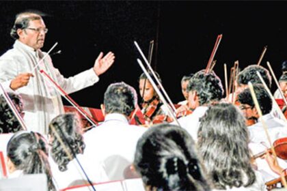 Fr Peter Cardozo conducts the All Goa Fusion Concert