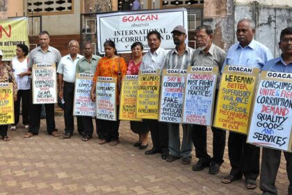GOACAN volunteers outside the Communidade building, Margao as part of an awareness action against corruption.