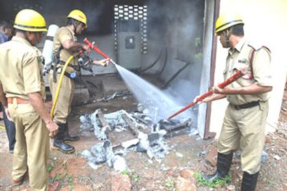 Goa State Fire Force personnel douse the fire that engulfed  LT panel
