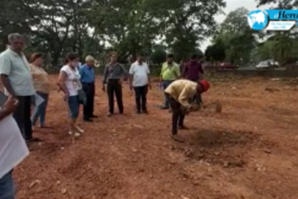 Goa State Pollution Control Board officials collect samples of the waste dumped at Margao