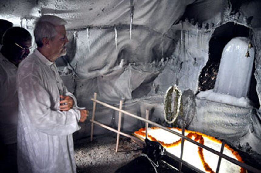 Governor Bharat Vir Wanchoo looks at the Shivlinga carved out from ice