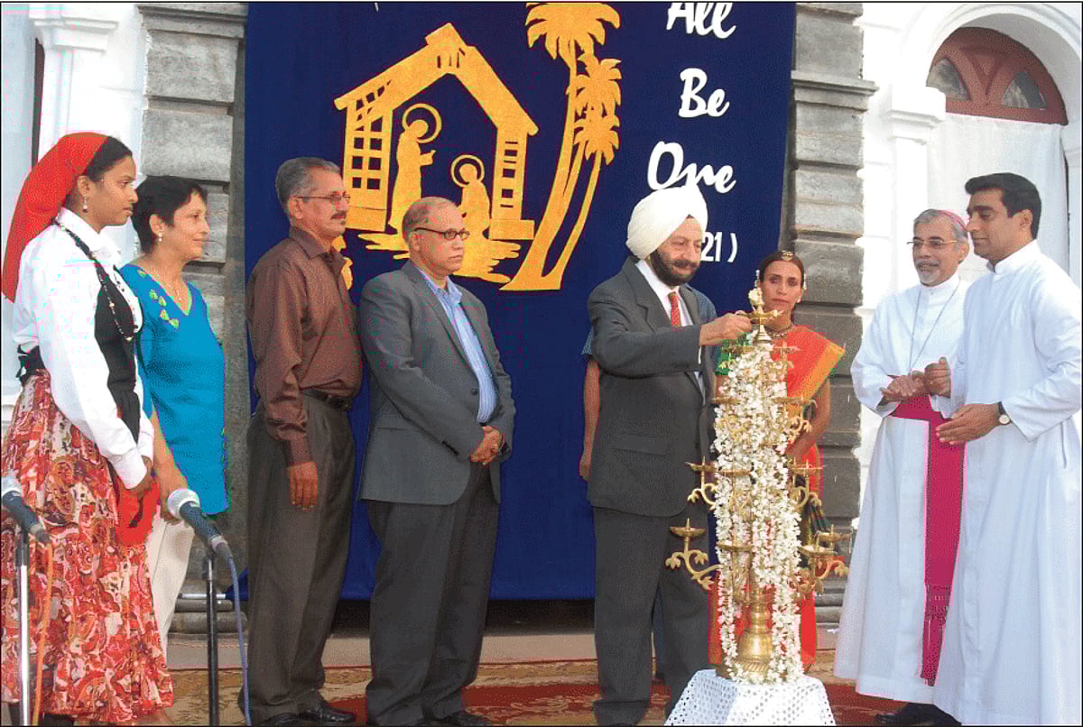 Governor S S Sidhu, lighting the lamp at the annual civic reception at the Archbishop's House on the occasion of Christmas. Also present is Archbishop-Patriarch Filipe Neri Ferrao and Chief Minister Digambar Kamat among others.