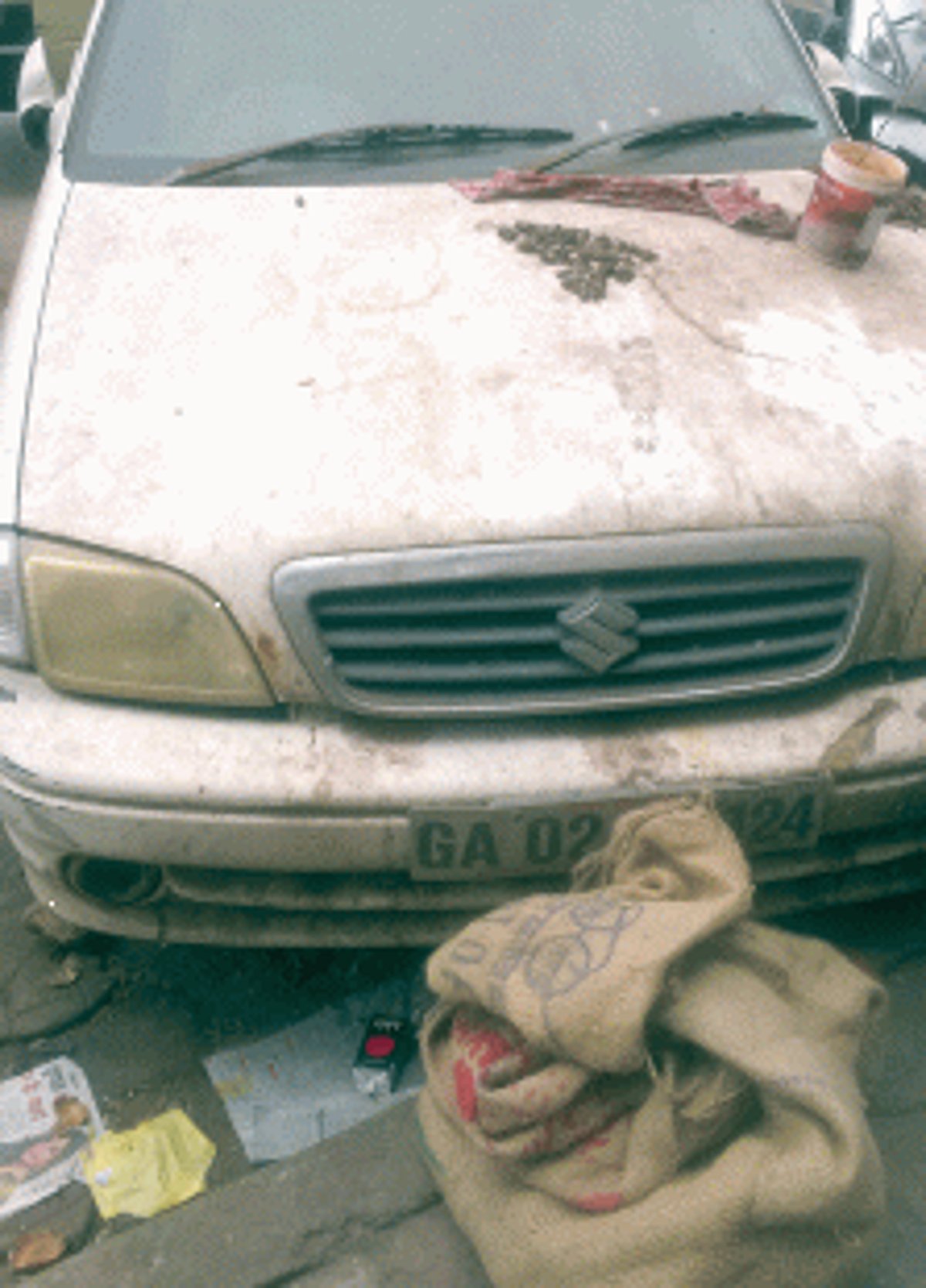 Govt vehicle abandoned in parking lot