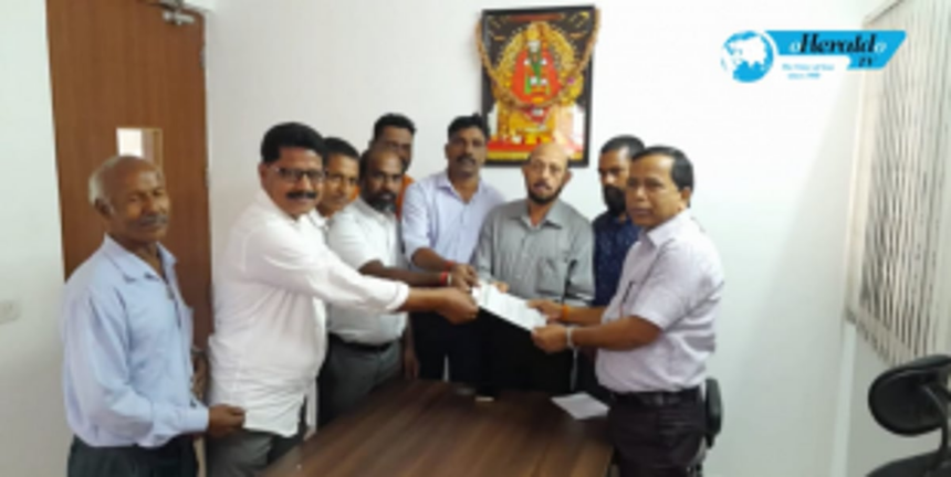 Greenfield Mopa Taxi Association submits a memo to Asst. Director of Transport requesting Yellow Black Taxi parking 1 Greenfield Mopa Taxi Association submits a memo to Asst. Director of Transport requesting Yellow Black Taxi parking