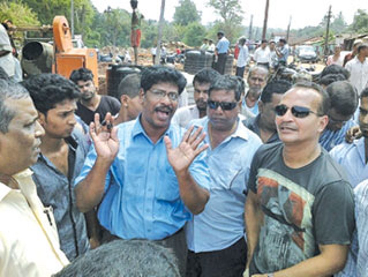 Gurudas Shirodkar argues over the construction of a culvert in Chimbel