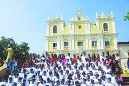 HEARTY WELCOME: Children who received Sacrament of Holy Communion on the feast of Three Kings at Our Lady of Snows Church, Raia, Sunday.