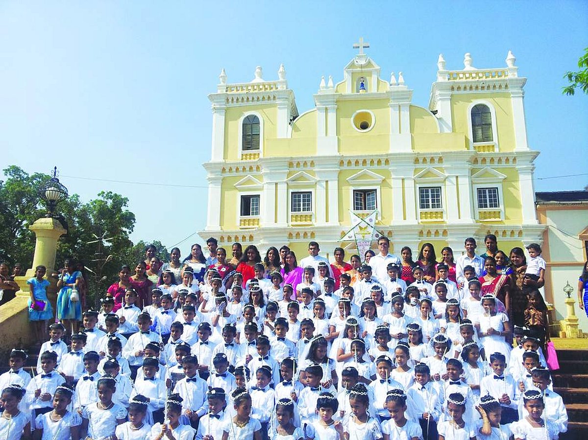 HEARTY WELCOME: Children who received Sacrament of Holy Communion on the feast of Three Kings at Our Lady of Snows Church, Raia, Sunday.