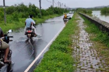 Hazardous road conditions lead to a bike accident as woman falls into submerged pothole in Britona