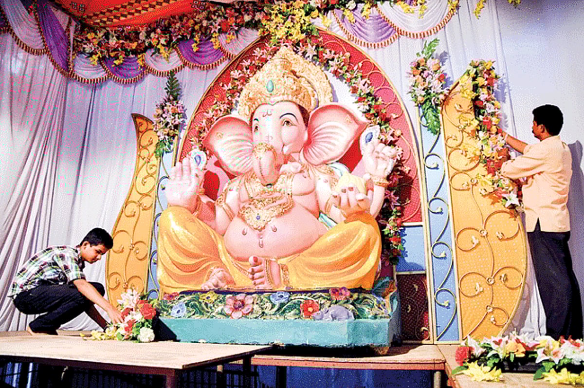 Hindus decorate the pedestal and its surrounding where the Panjim Sarvajanik Ganesh will be formally installed on Ganesh Chaturthi on Monday.
