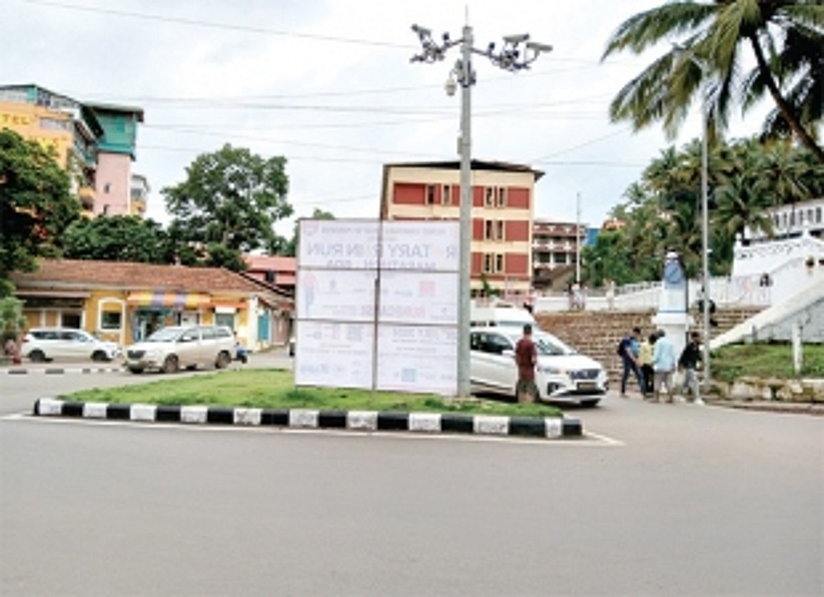 Hoarding erected on traffic island causing hindrance to motorists