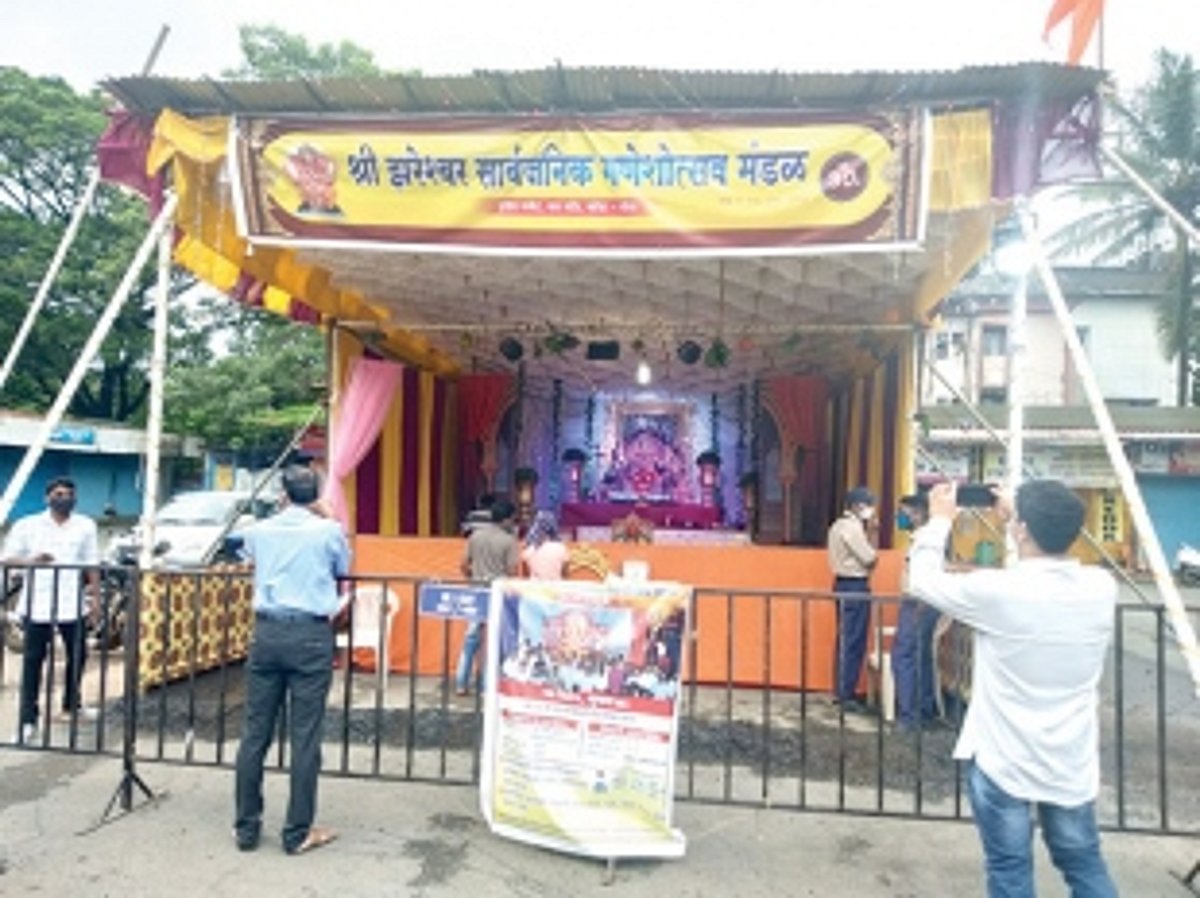 Households perform ghumat arti of Lord Ganesh with social distancing