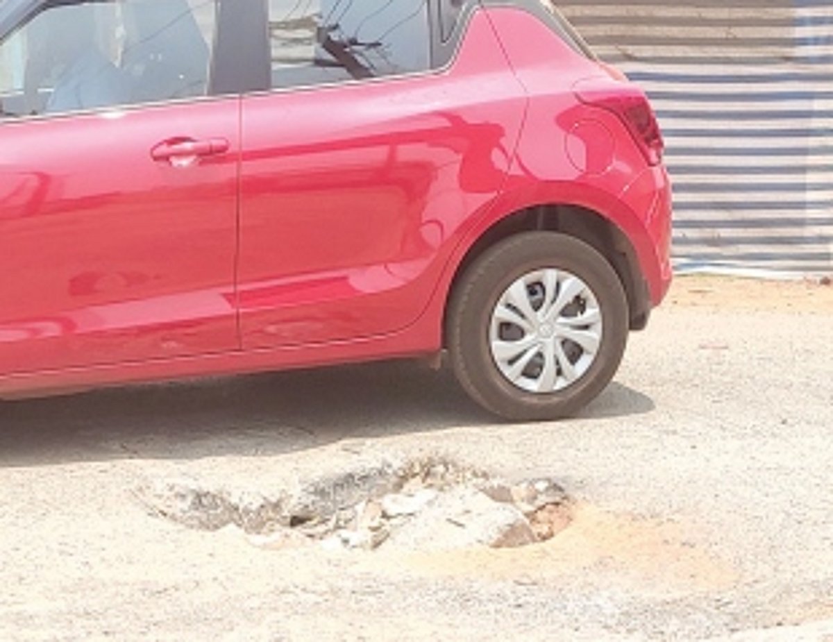 Huge pothole at Bhom junction in  Paliem poses danger to motorists