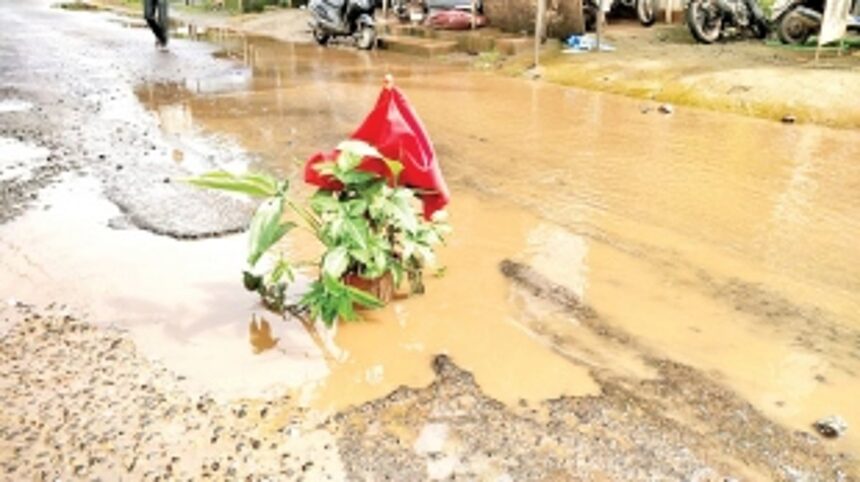 Huge potholes on Morjim road