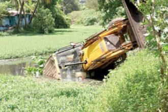 JCB falls in St Inez Nullah