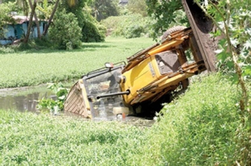 JCB falls in St Inez Nullah