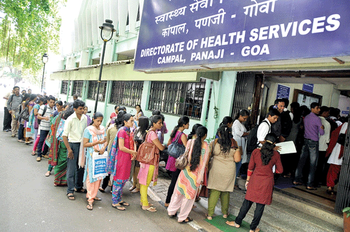 JOB SEEKERS: Candidates wait in a queue for a walk-in-interview for different posts in the Institute of Nursing Education, Bambolim, at Directorate of Health Services, Panjim on Friday