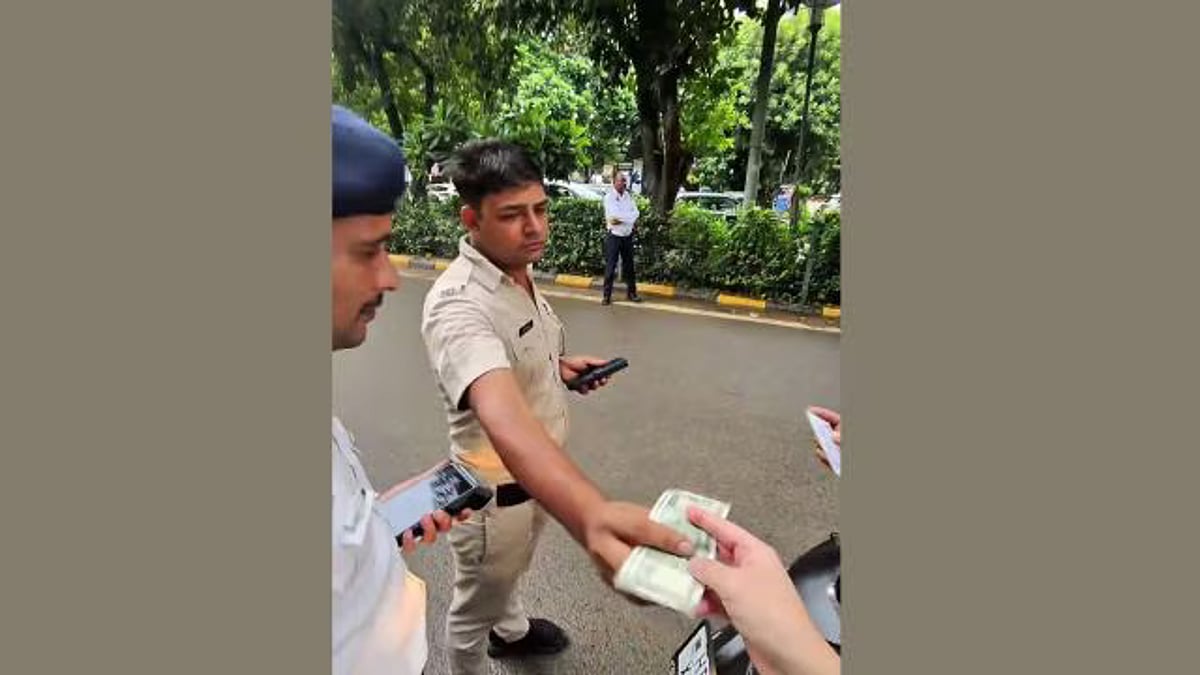Japanese Tourist’s Smart Glasses Expose Gurugram Traffic Cops Taking INR 1,000 Bribe