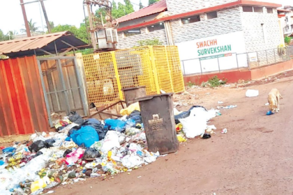 KTC Mapusa Bus-Stand Faces Dangerous Potholes and Uncollected Garbage, Endangering Commuters