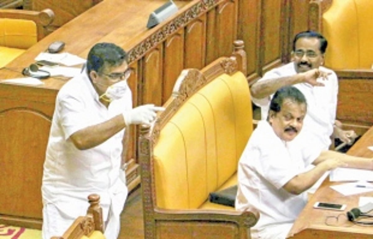 Kerala MLA stirs up storm wearing mask, gloves in assembly